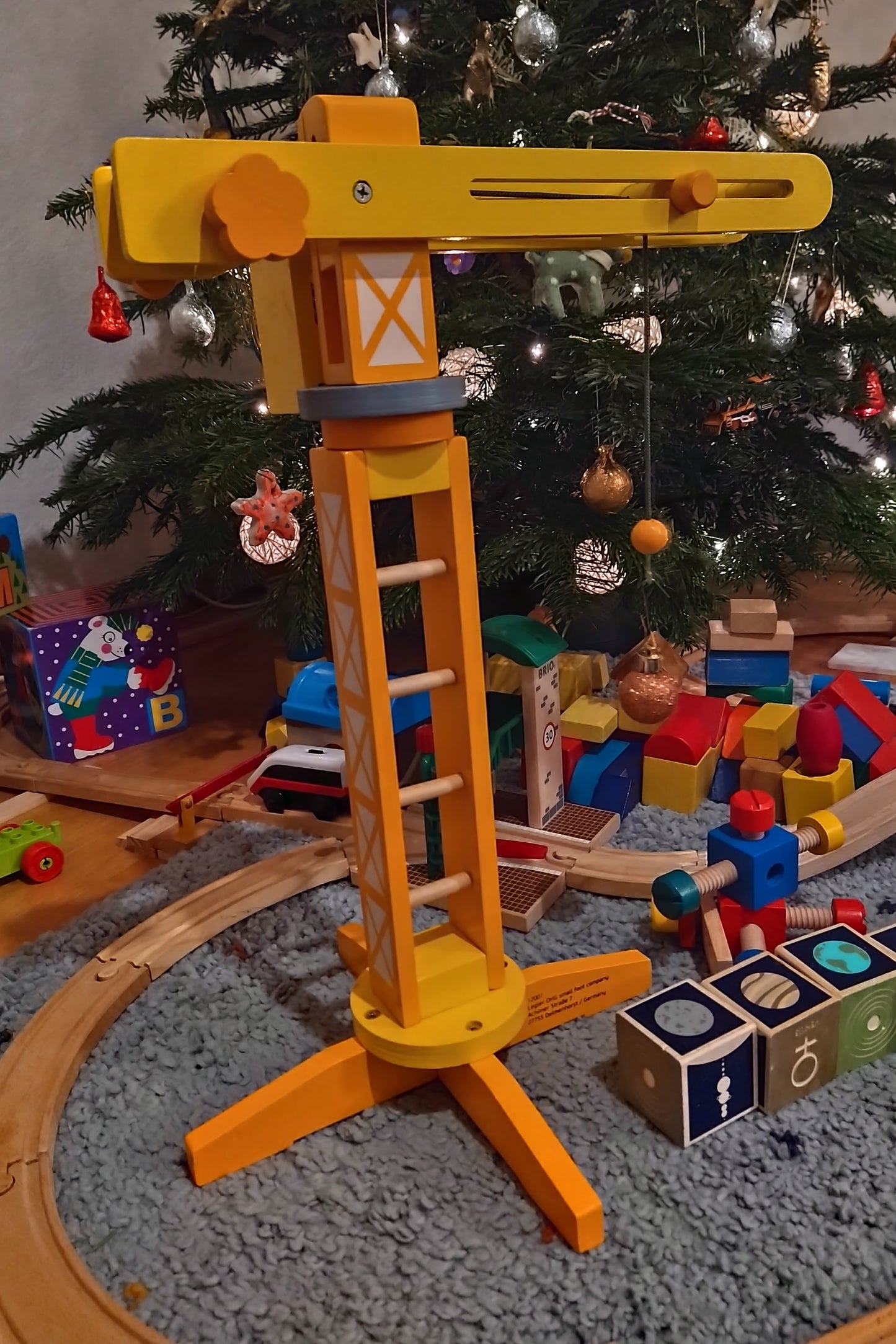 Small Feet Wooden Crane Toy