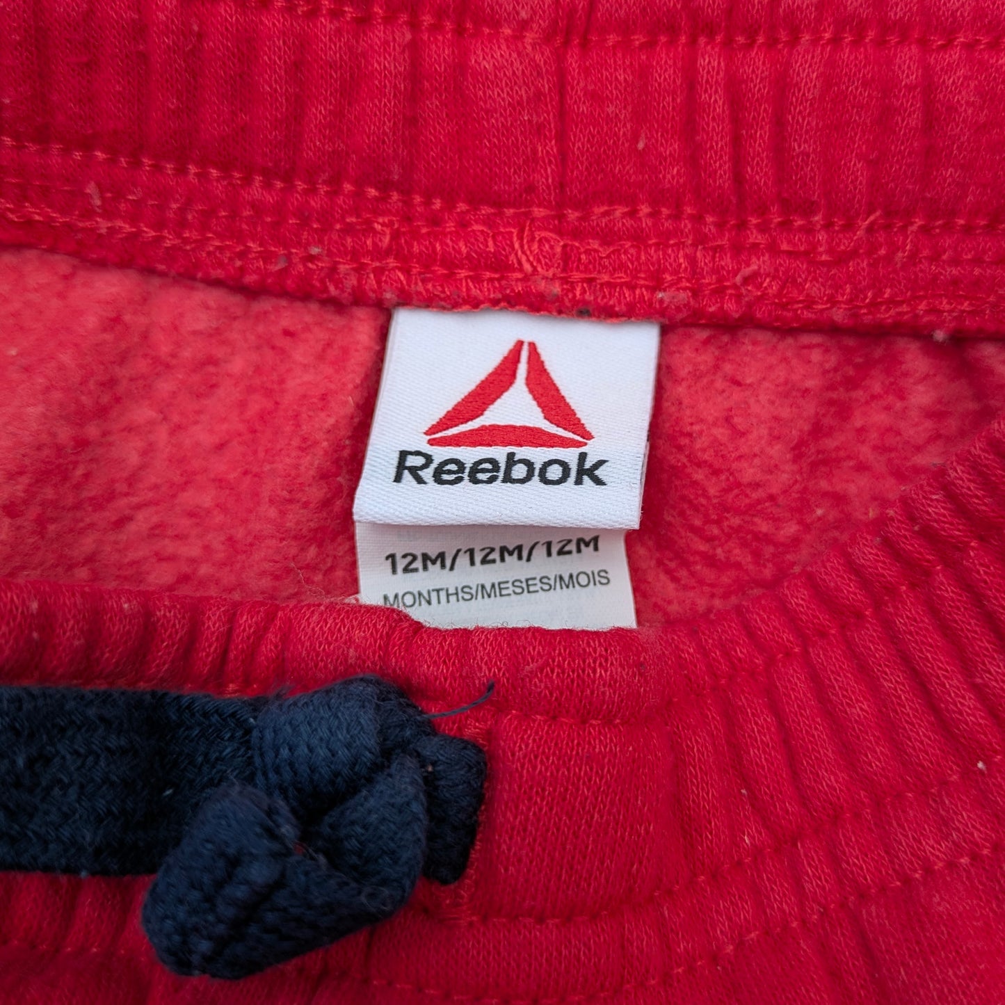 Reebok red trousers - 12 mo